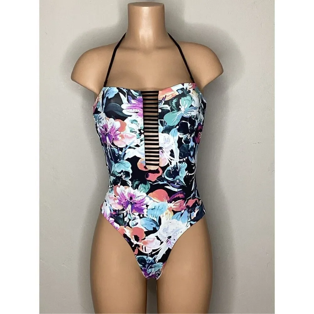 New. WET watercolor floral reversible swimsuit. X-Small. Retails $208